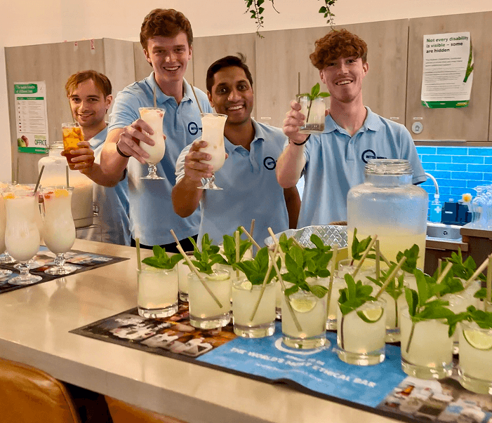 BetterWorld event team raising sustainable cocktails at a corporate hospitality event